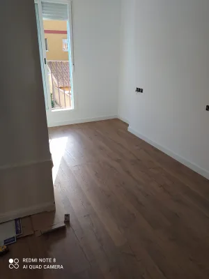 Instalación de suelo de madera natural en Sevilla